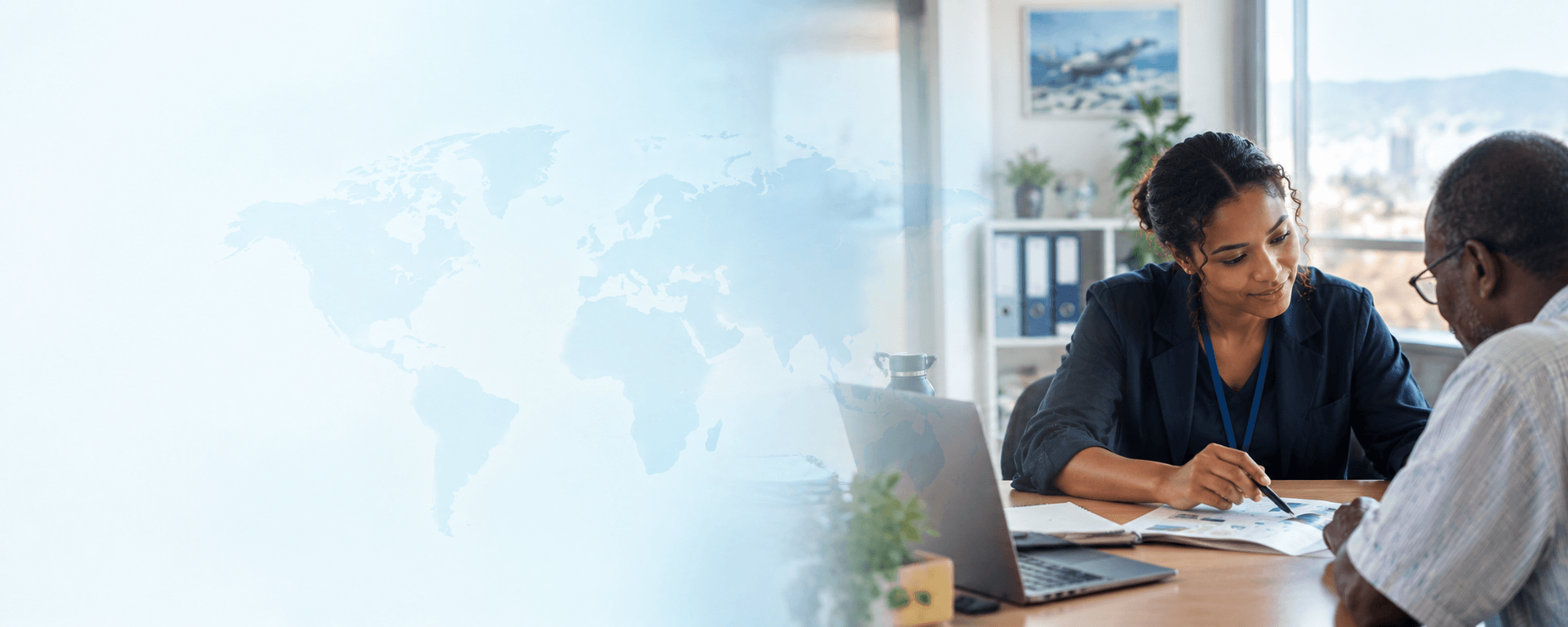 A consultant reviewing documents with a client in a modern office overlooking the city, with a faded world map over the wall behind them